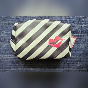 Timree diagonal black and white pinstriped with lipstick kiss makeup bag